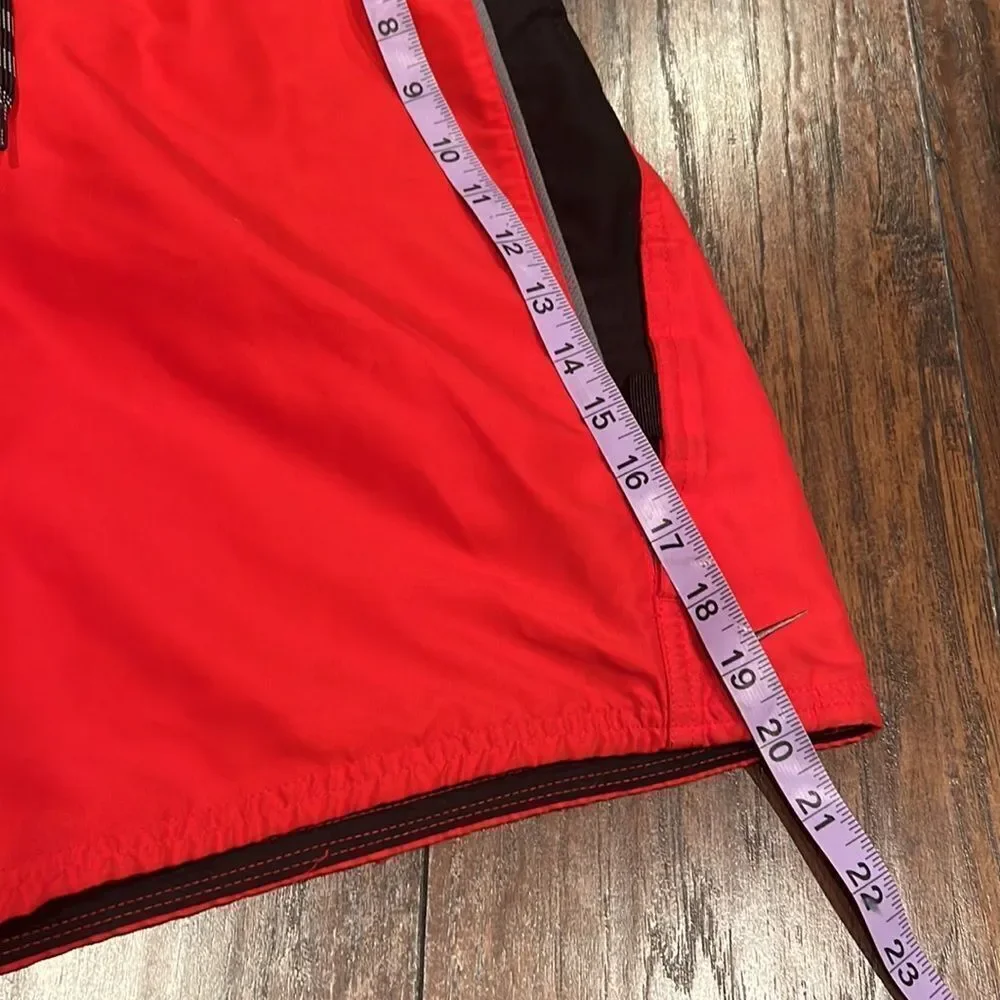 nike swim trunks size L red and black embroidered grey logo EUC with pockets